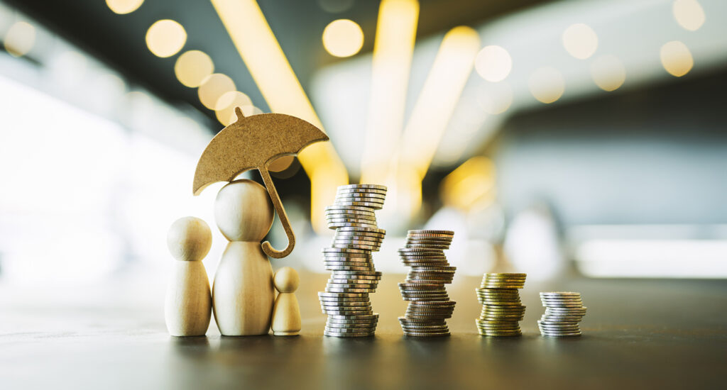 Figures with umbrella and stacked coins.