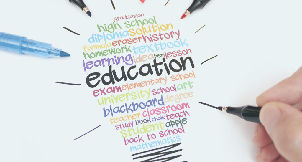 Education words lightbulb blue